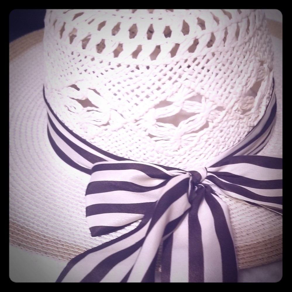 Beautiful beige hat with ribbon